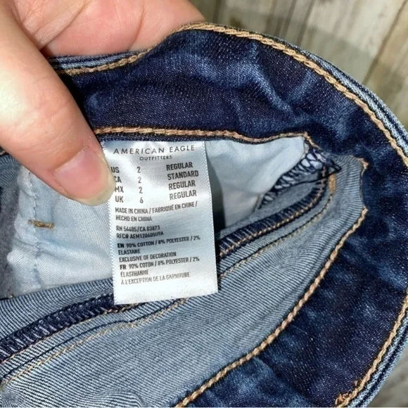 American Eagle Next Level Stretch Super High Rise Jegging Fray Bottom Jeans - Picture 6 of 8